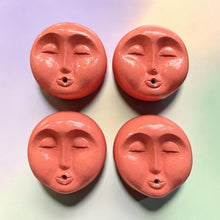 Load image into Gallery viewer, Four round coral moon face incense holders made from concrete
